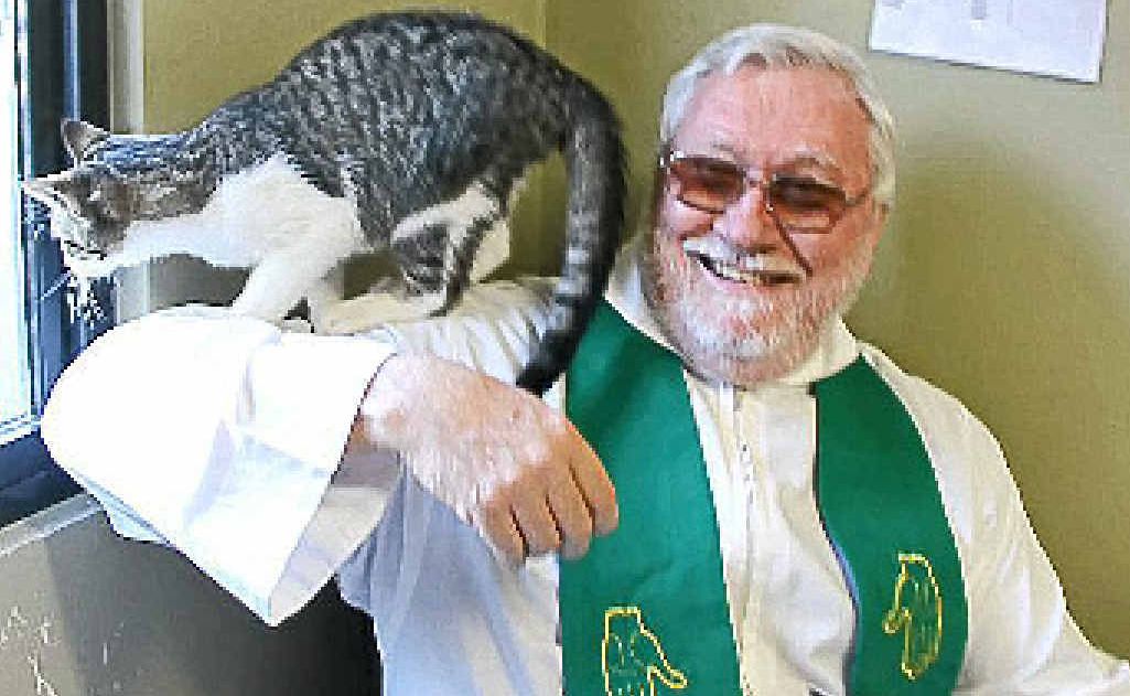 Father Kevin Lewis has fun blessing RSPCA animals on Sunday. Father Kevin Lewis has fun blessing RSPCA animals on Sunday.